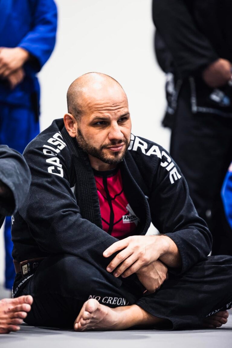 Joseph Ortiz sitting on the mat during Brazilian jiu-jitsu training, representing discipline, consistency, and accountability on his personal growth journey with the Uncaged Men’s Only Accountability Group.