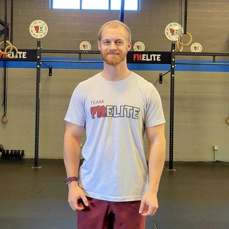 Korey Jacobson standing in a gym, representing personal growth, discipline, and professional transformation through the Uncaged Men’s Only Accountability Group.